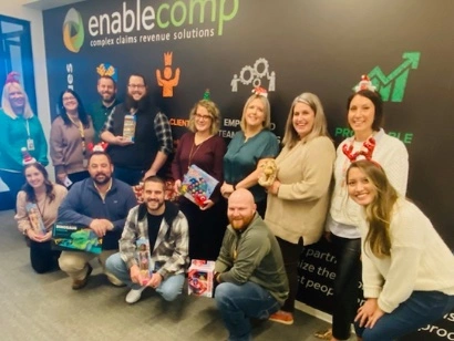 EnableComp group photo for holiday toy drive 2023