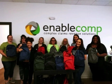 EnableComp group photo for backpack drive